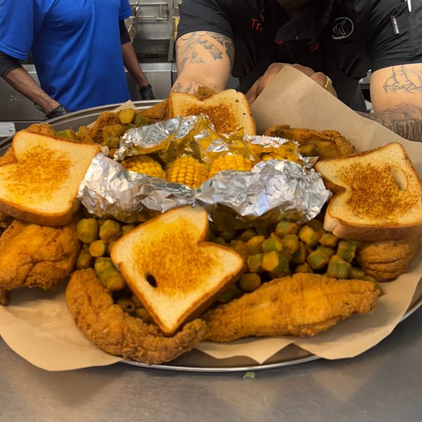A large platter of fried fish, okra, corn on the cob, and Texas toast from A'Nets Katch.